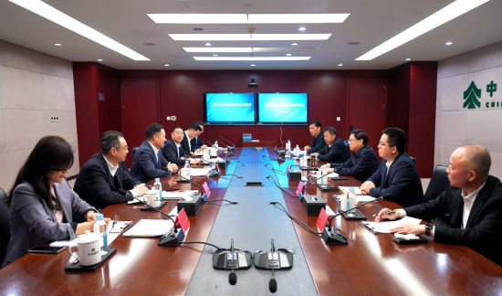 余紅輝會見河南省信陽市委副書記、市長陳志偉一行